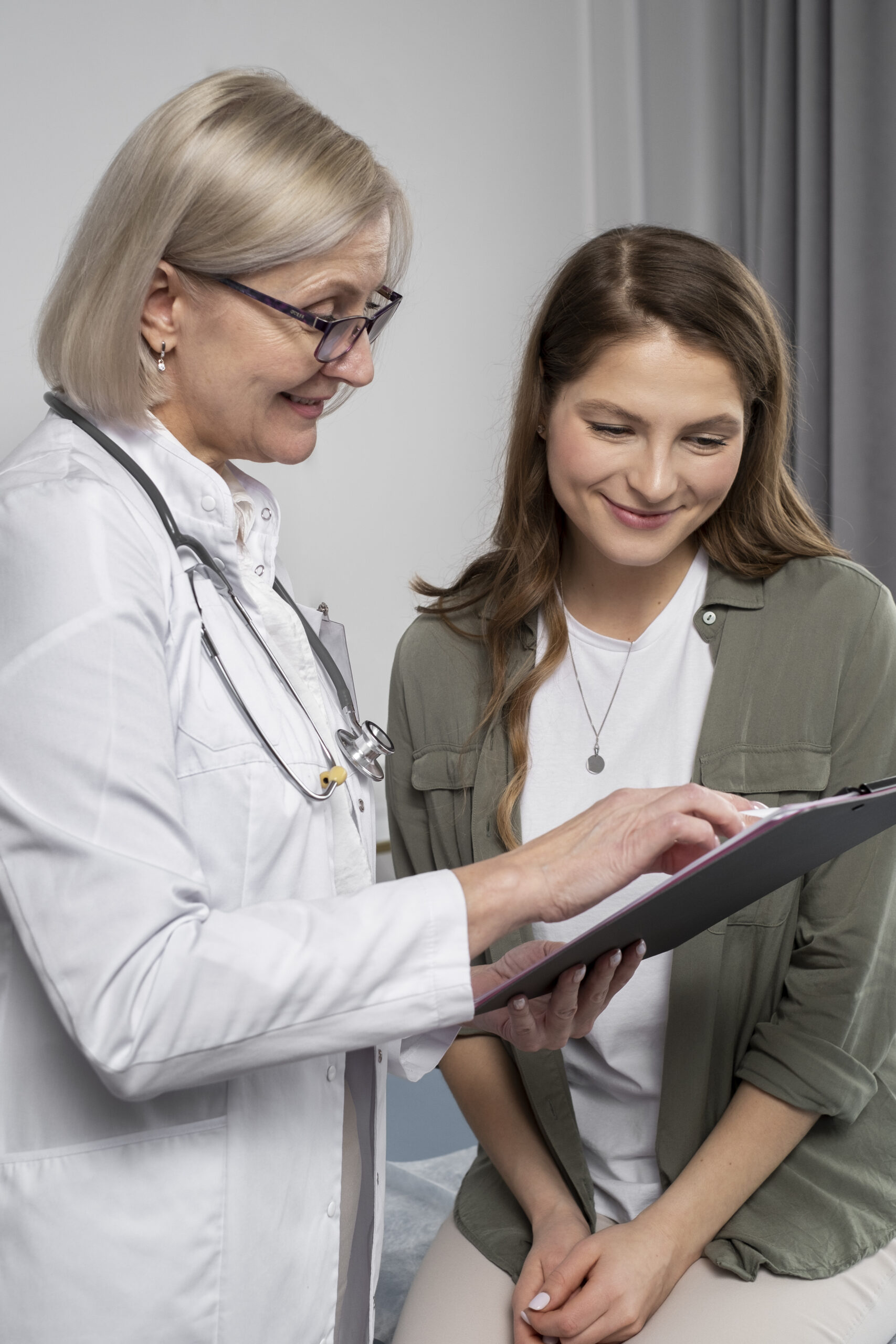 smiley doctor patient chatting medium shot